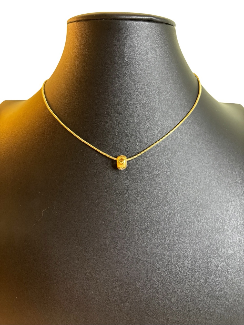 Gold-Tone Minimalist Floating Textured Bead Pendant Necklace.